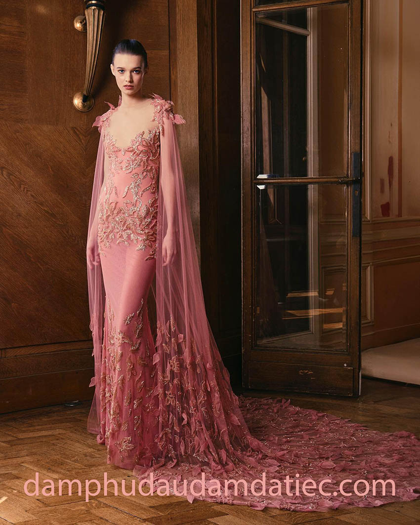 fitted dress with a sheer divine cape features 3D petals